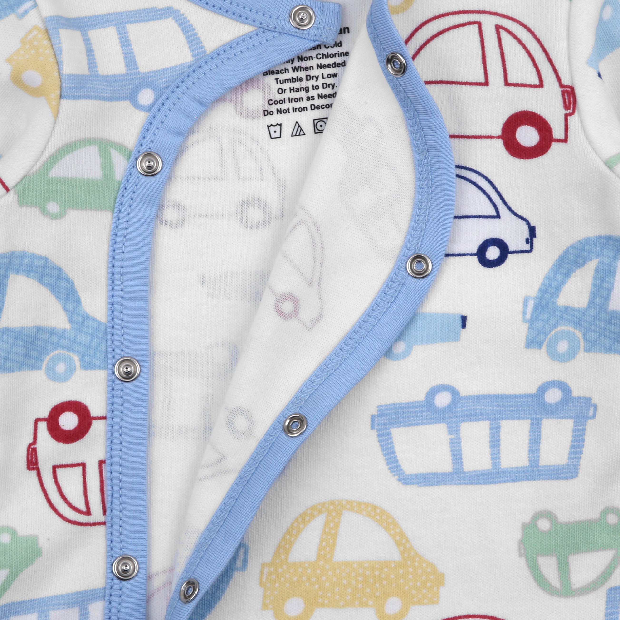 Baby outfit with blue buttons and car pattern